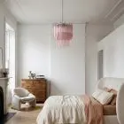 107 pink prism Murano chandelier hanging in a bedroom