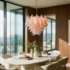 53 pink lattimo Murano chandelier hanging in a diningroom