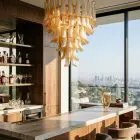 75 petals amber lattimo Murano glasses chandelier hanging in a diningroom