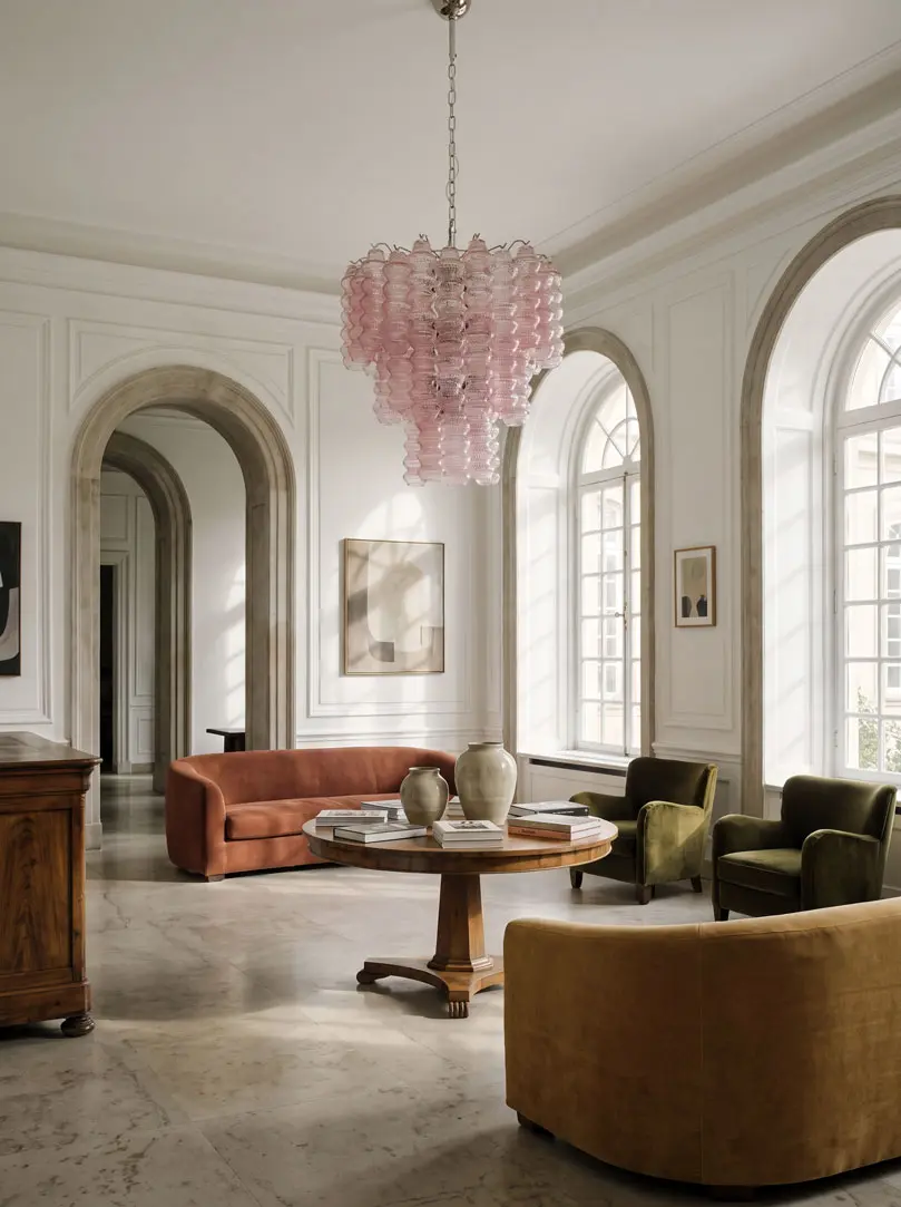 48 pink Murano curva tubes hanging in Hotel lobby