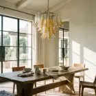 53 amber petals chandelier hanging in a diningroom