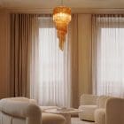 86 amber spiral Murano chandelier hanging in livingroom