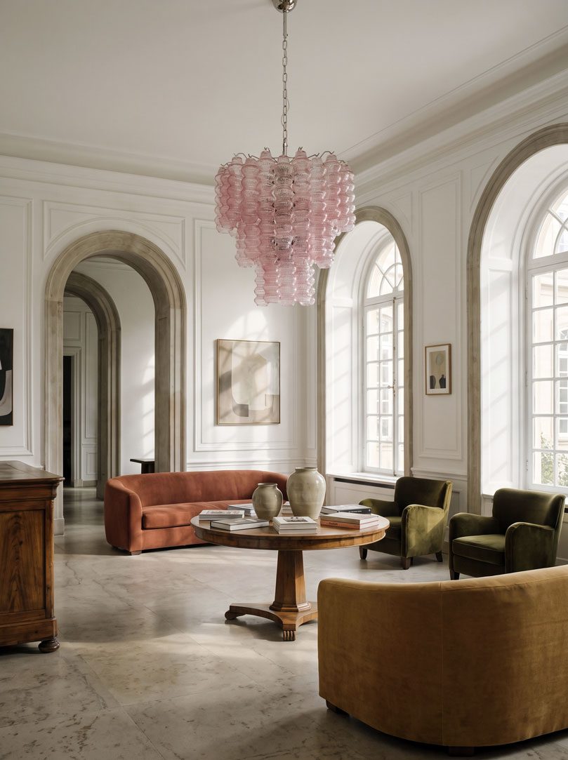 48 pink Murano curva tubes hanging in Hotel lobby