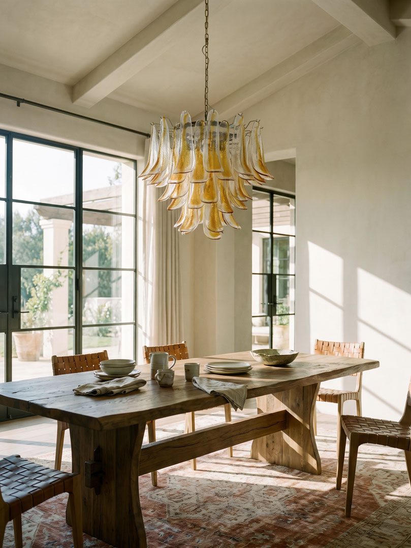 53 amber petals chandelier hanging in a diningroom