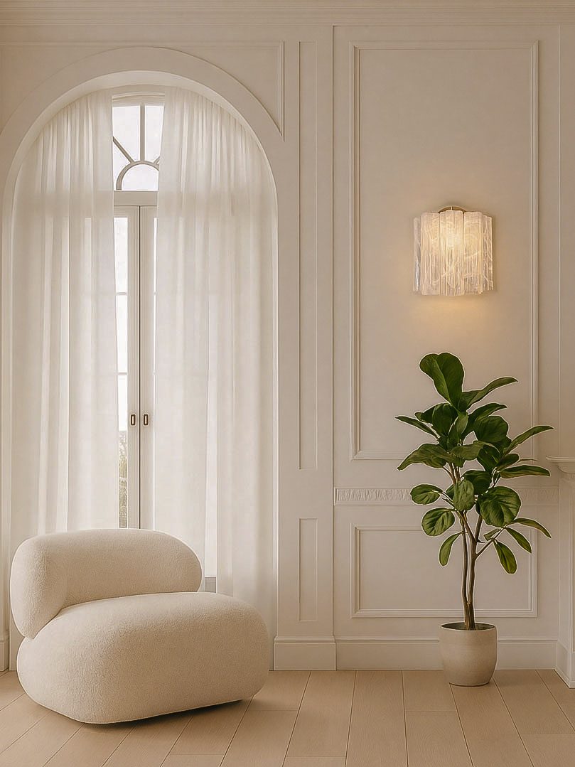 5 tube white alabaster wall light hanging in livningroom